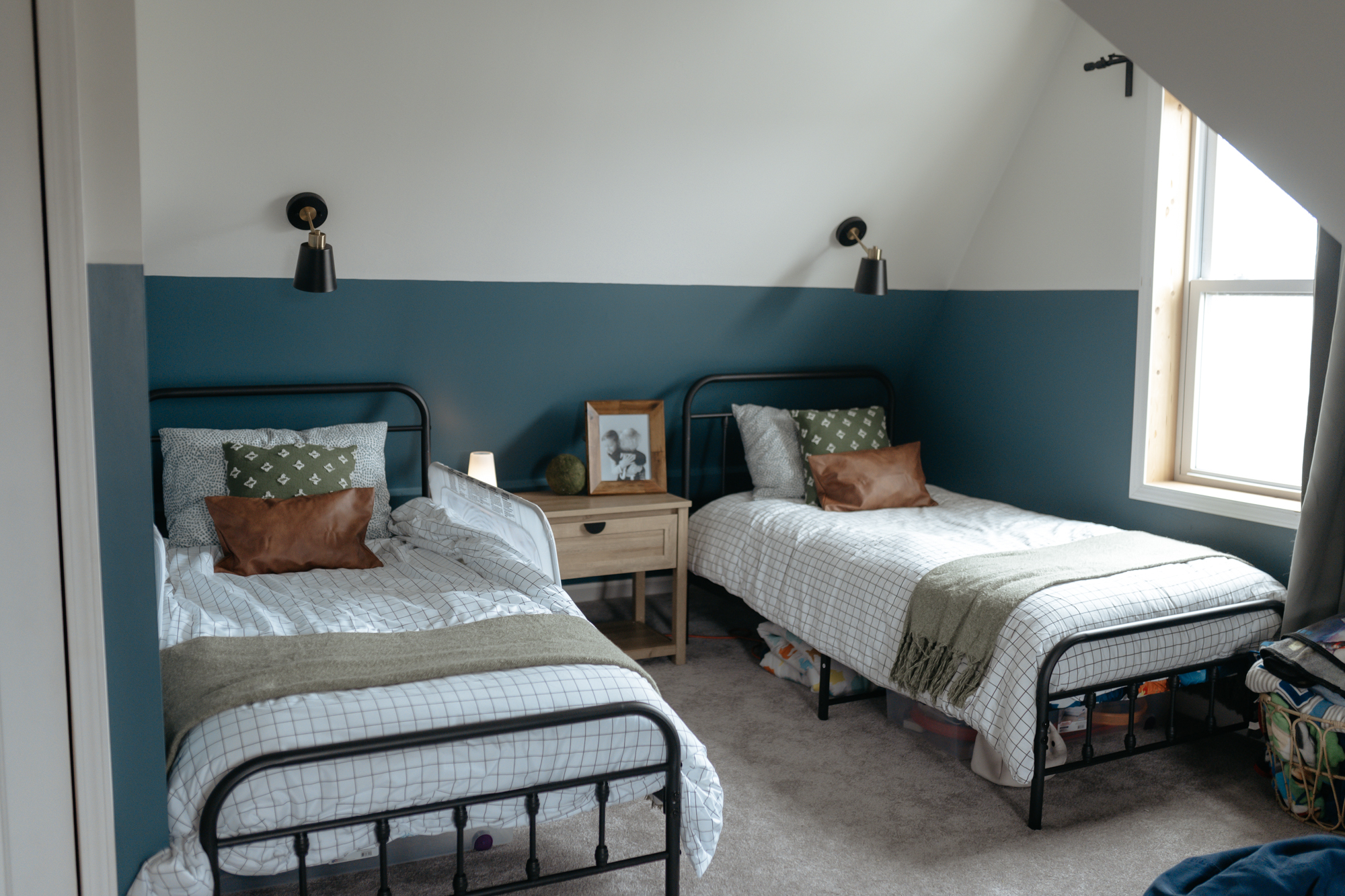 Two twin beds with matching sheets and comforters